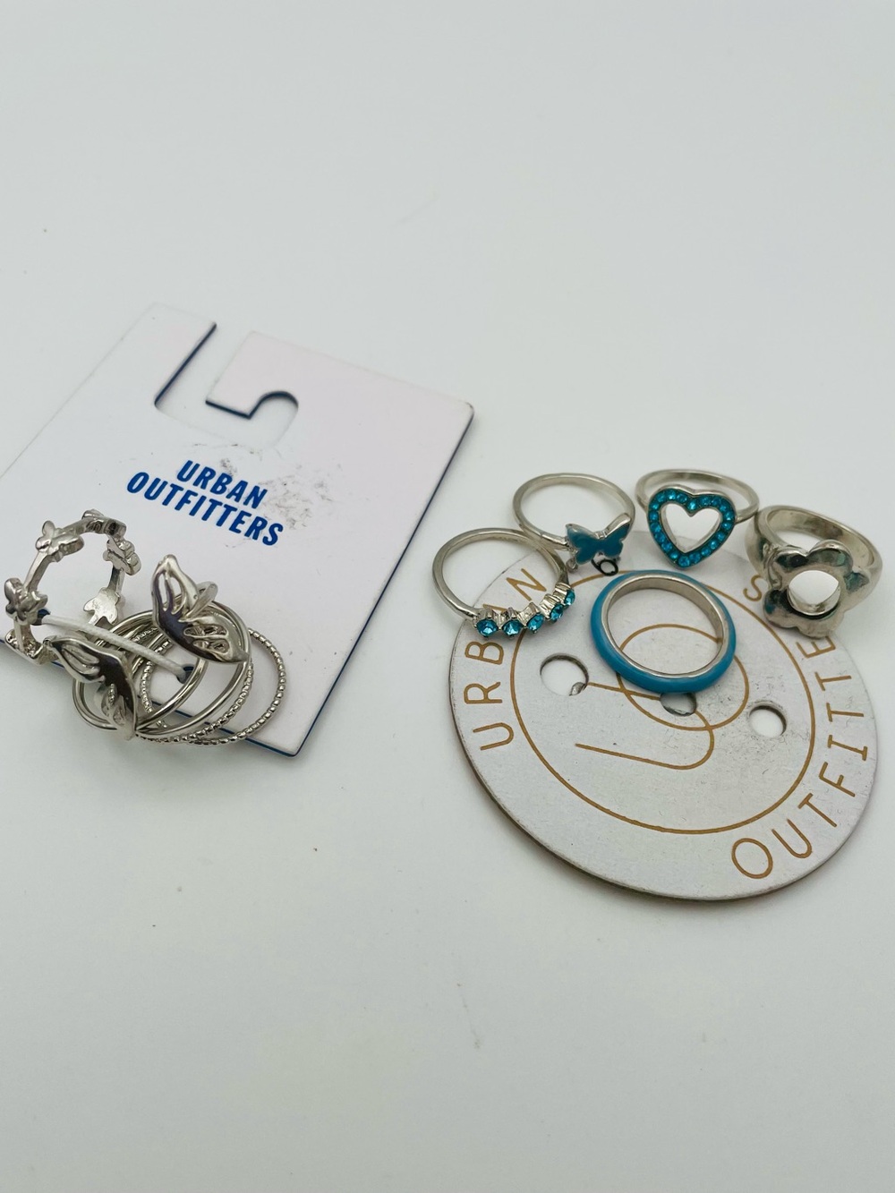 Urban Outfitters 2 Ring Sets-Teal Heart Stack & Silver Butterfly Stack. Size 6